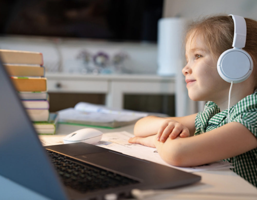 kid listening to a podcast for children